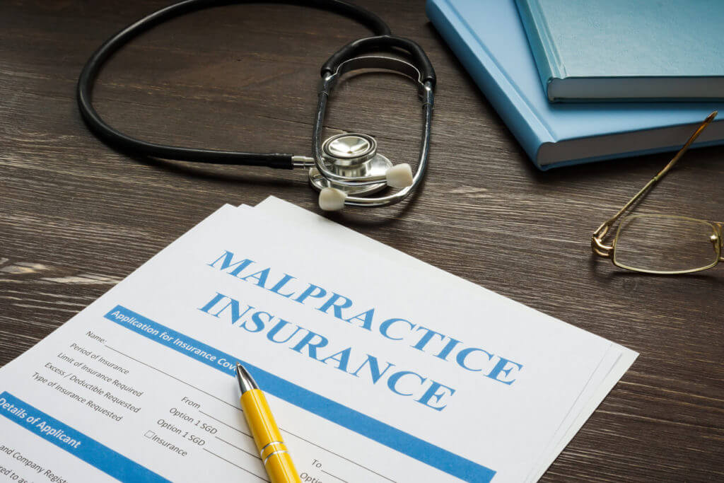 Medical malpractice insurance application with stethoscope